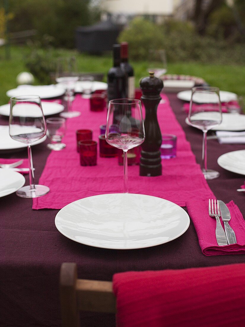 Table laid for a late summer party in the garden