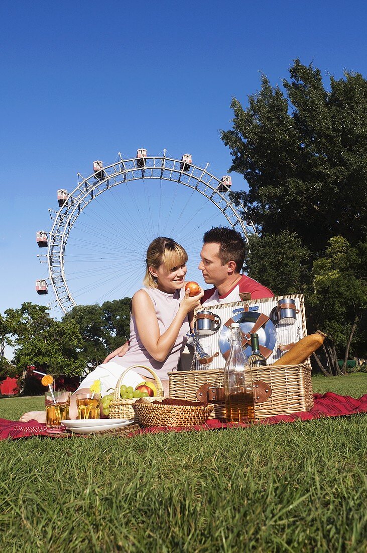 Couple picnicking in the Prater (Vienna, Austria)