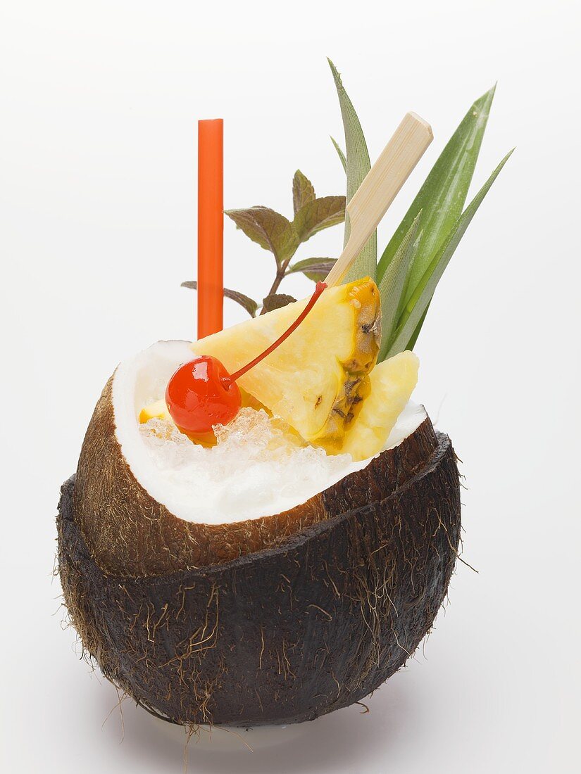Piña colada in hollowed-out coconut