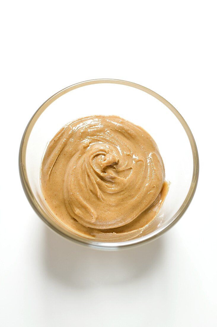 Peanut butter in glass dish