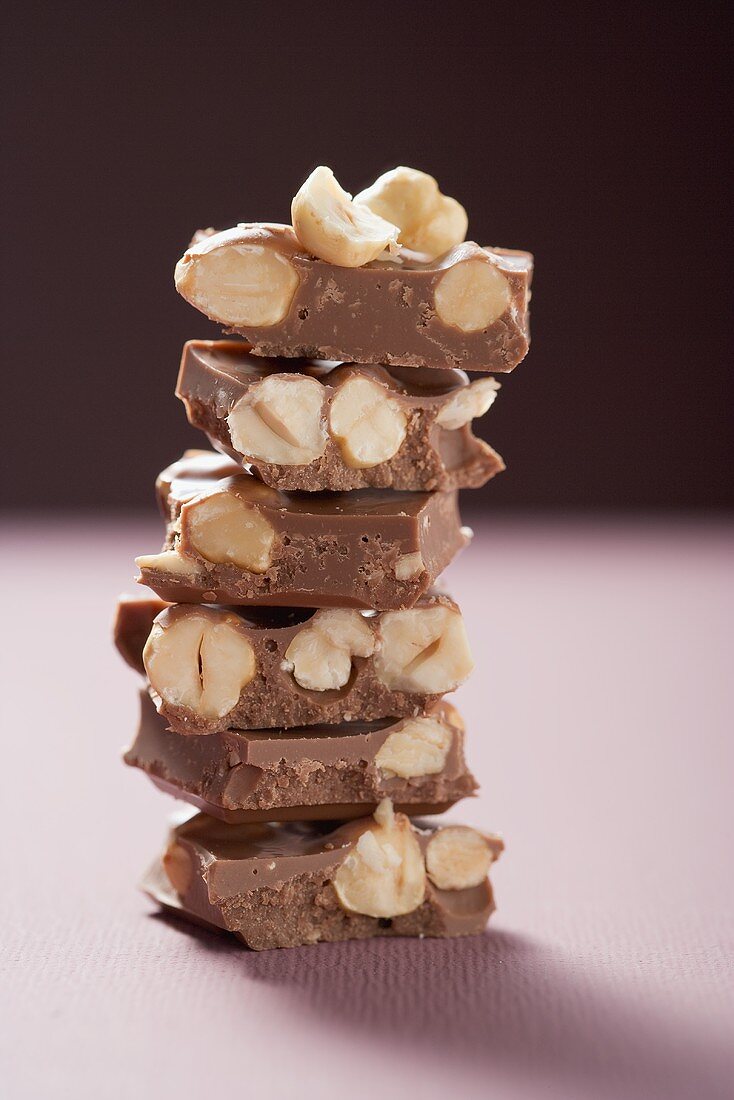 Several pieces of hazelnut chocolate, stacked