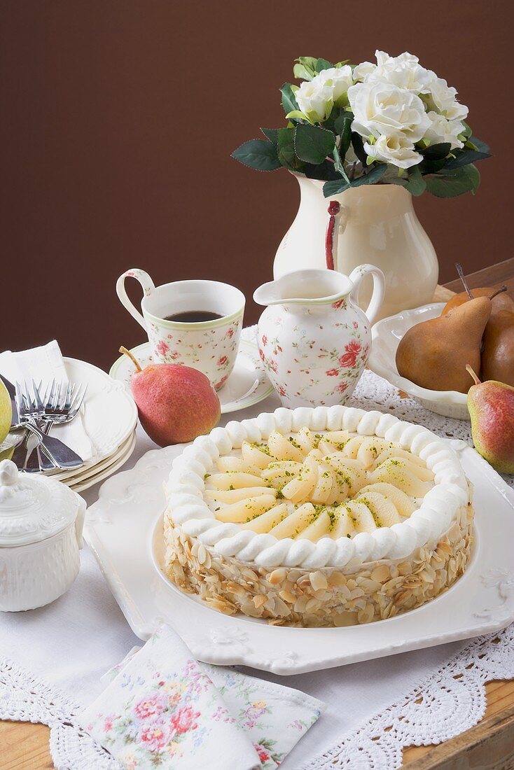 Pear cake with flaked almonds to serve with coffee