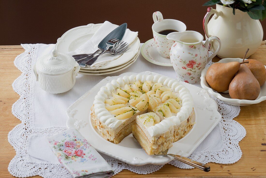 Pear cake with flaked almonds to serve with coffee