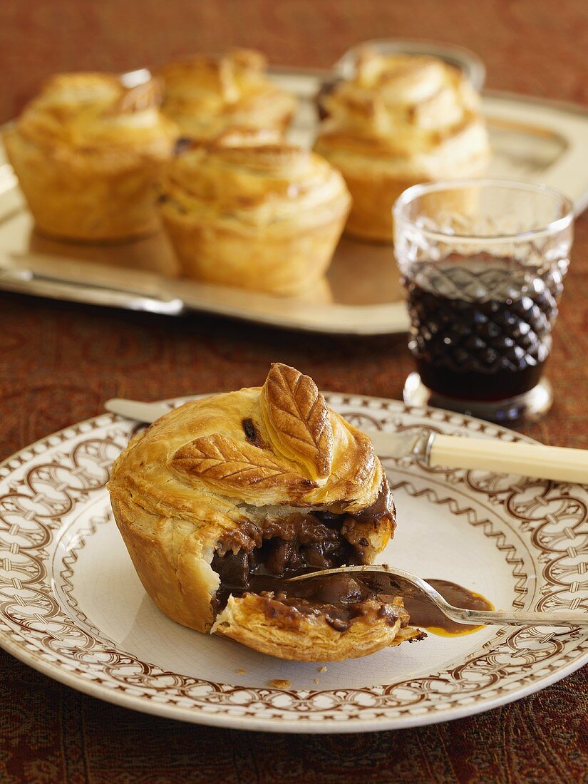 Venison pies and a glass of red wine