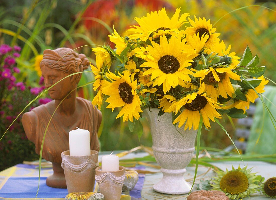 Vase of sunflowers and prairie cordgrass, terracotta bust