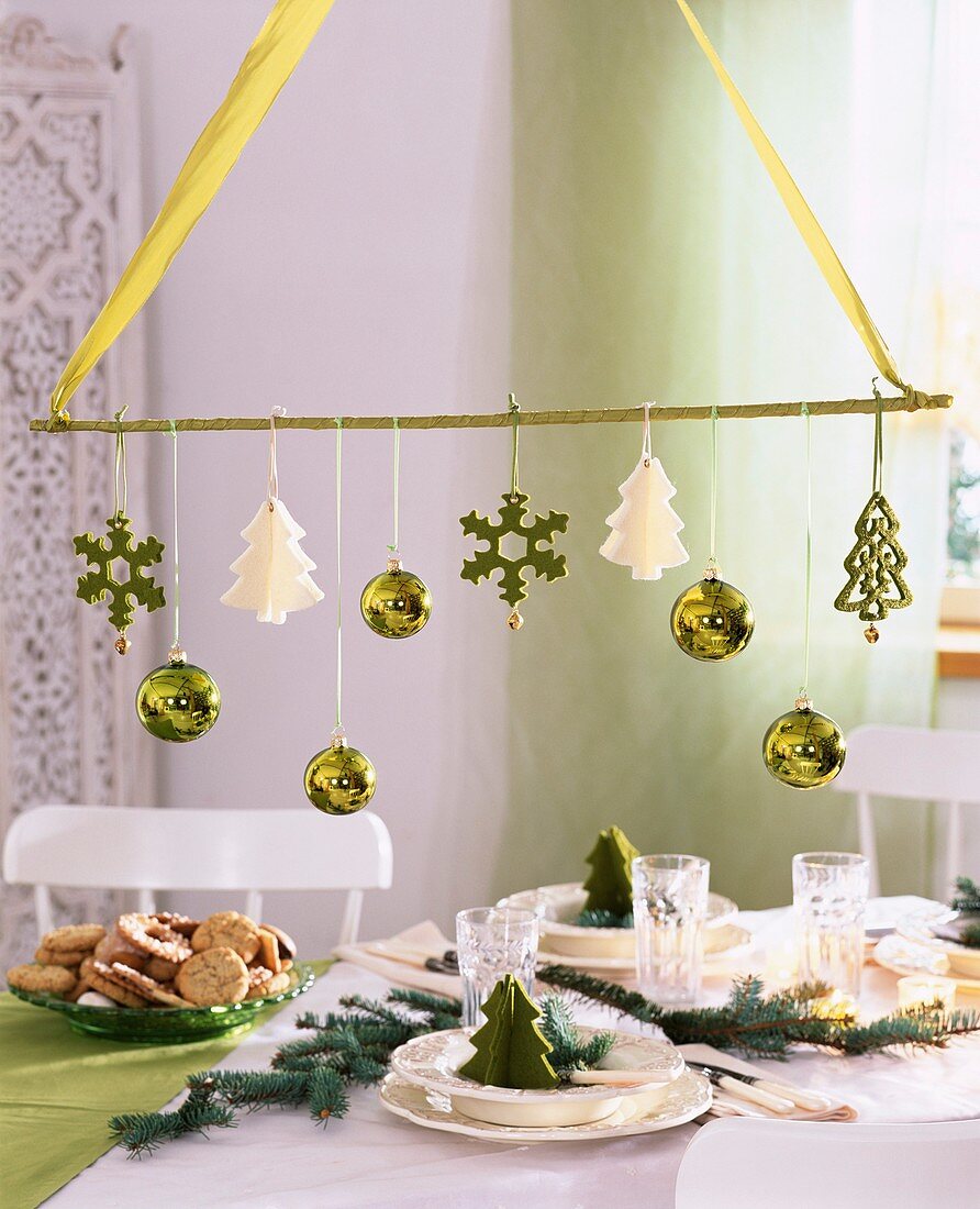 Hanging table decoration with tree ornaments