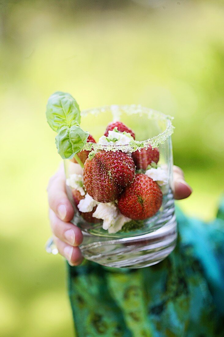 Fresh strawberries with ricotta and basil