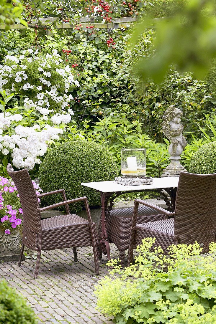 Garden furniture in summery garden