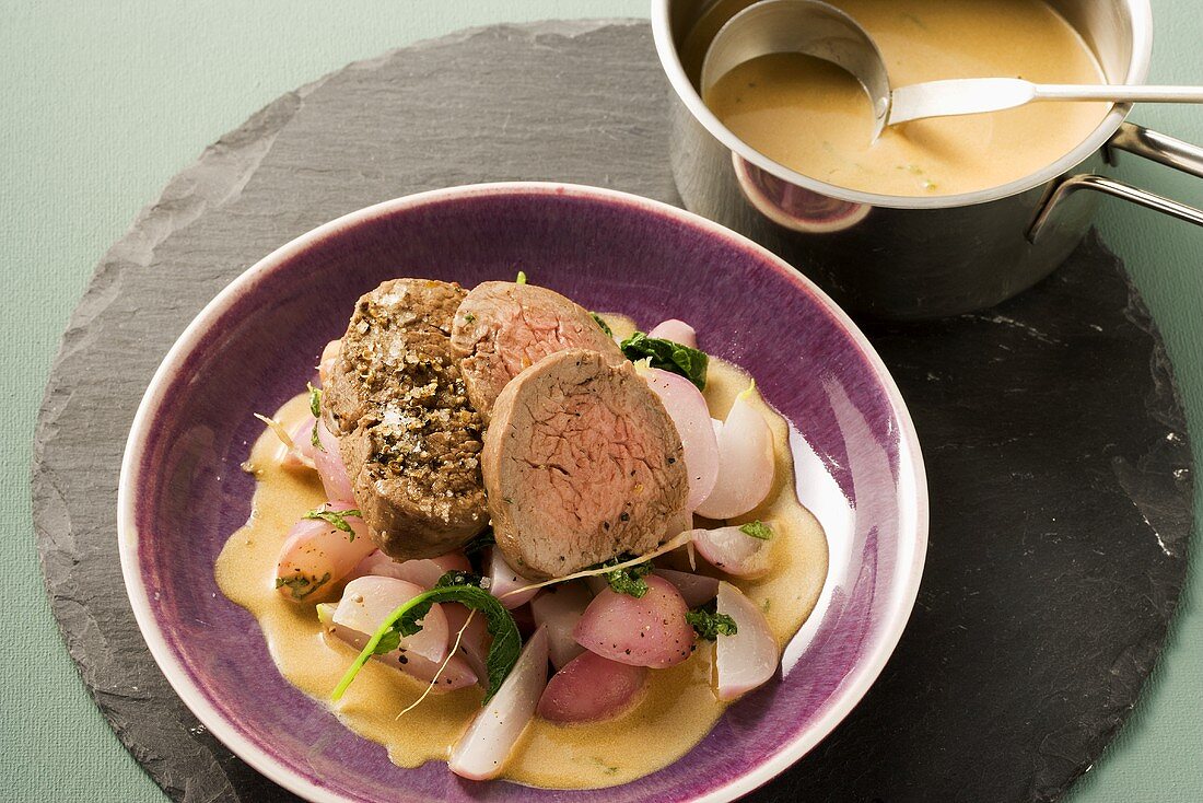 Poached beef fillet with radishes