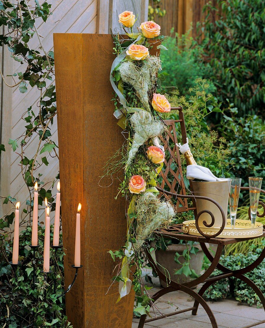 Iron vase decorated with chicken wire & straw & sisal hearts