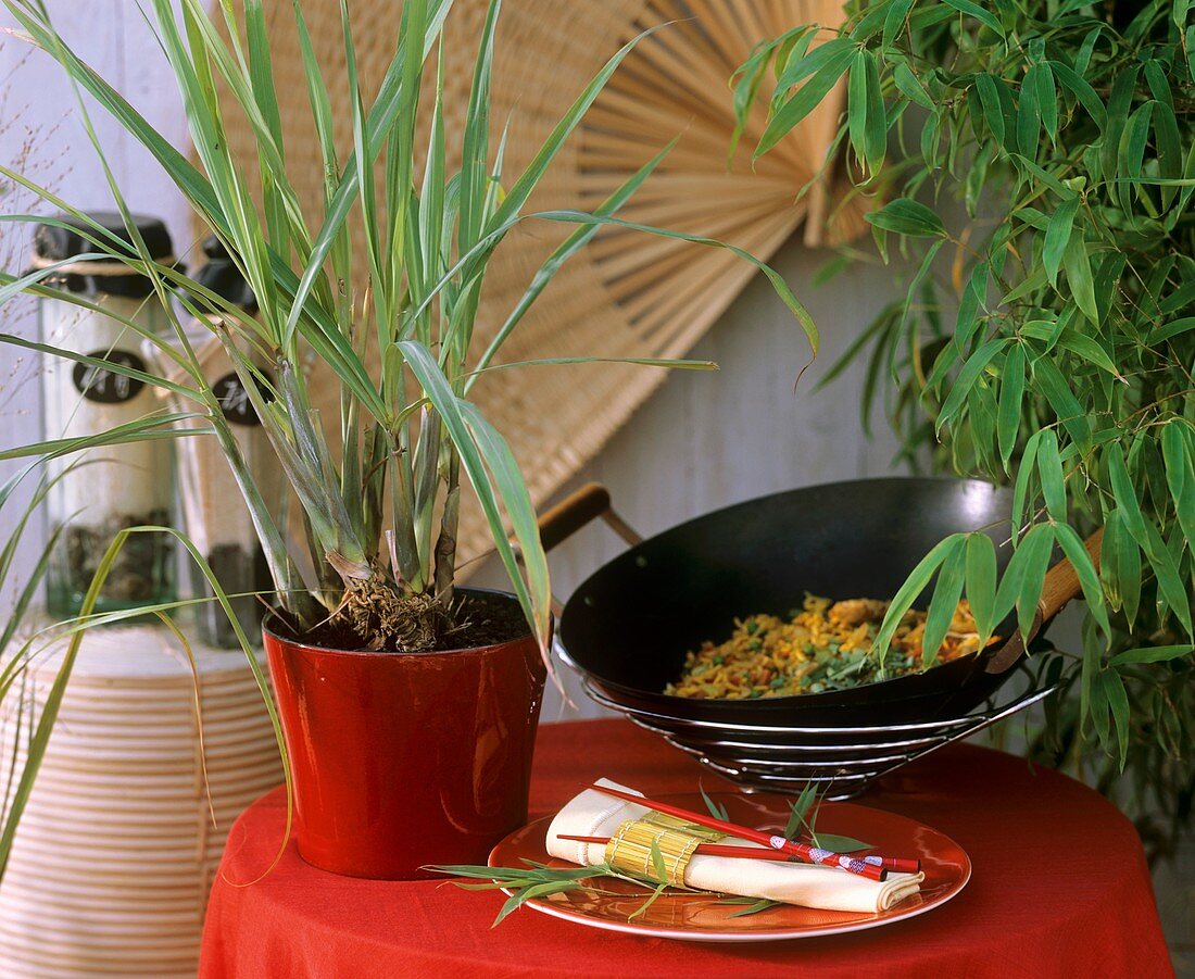 Still life with lemon grass and food in wok