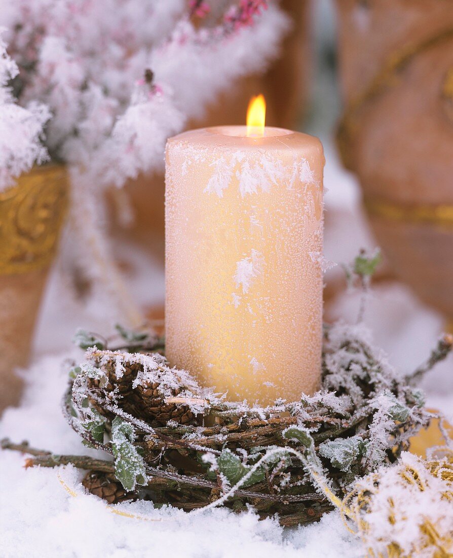 Candle with wreath of larch twigs