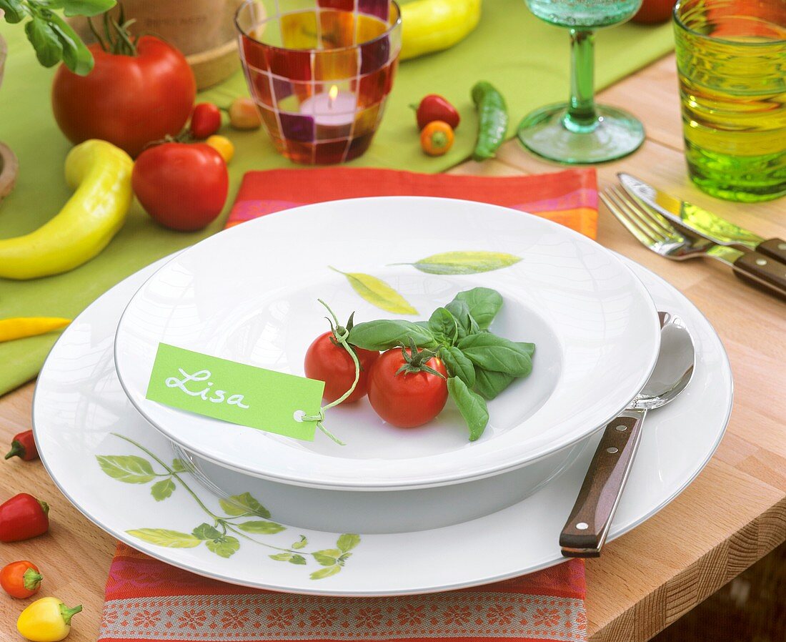Tomato and basil on plate with place-card