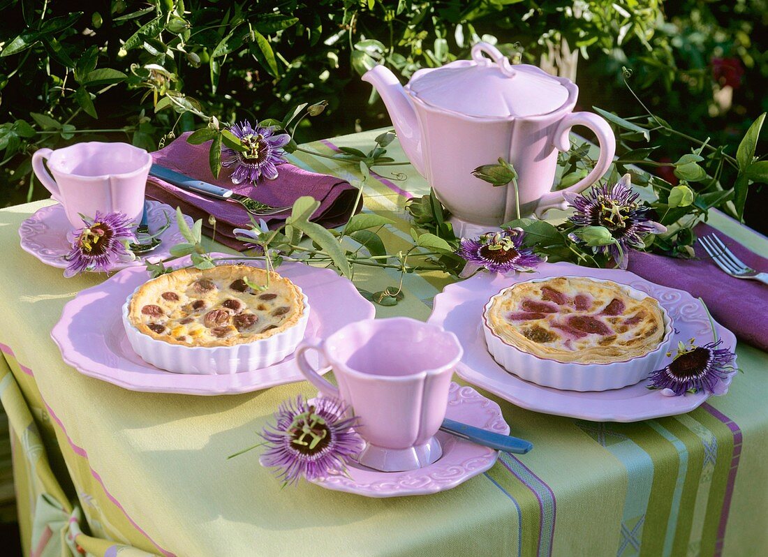 Grape tarts on table laid for coffee