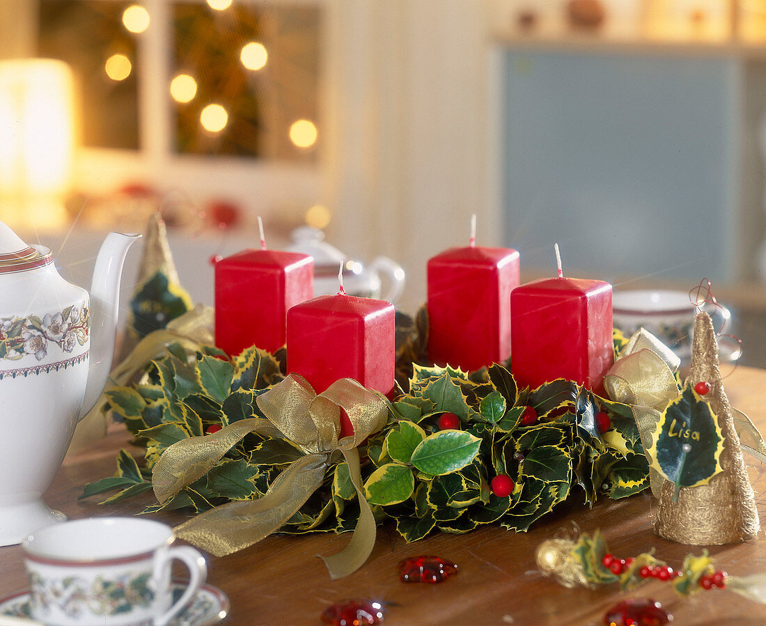 Classic holly Advent wreath with red candles