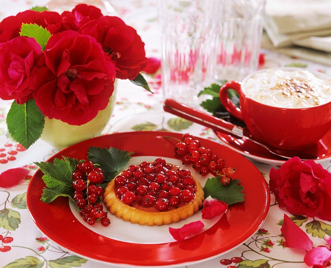 Redcurrant tarts, cappuccino and 'Flammentanz' roses