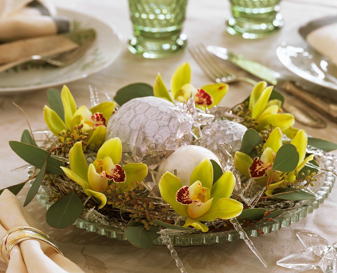 Wreath of orchids and Eucalyptus as Christmas decoration