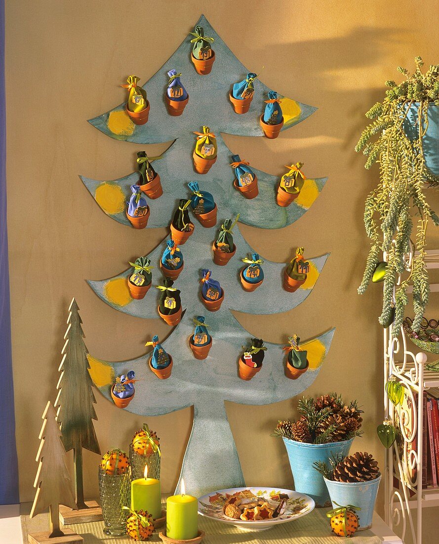 Advent calendar - plywood fir tree with terracotta pots