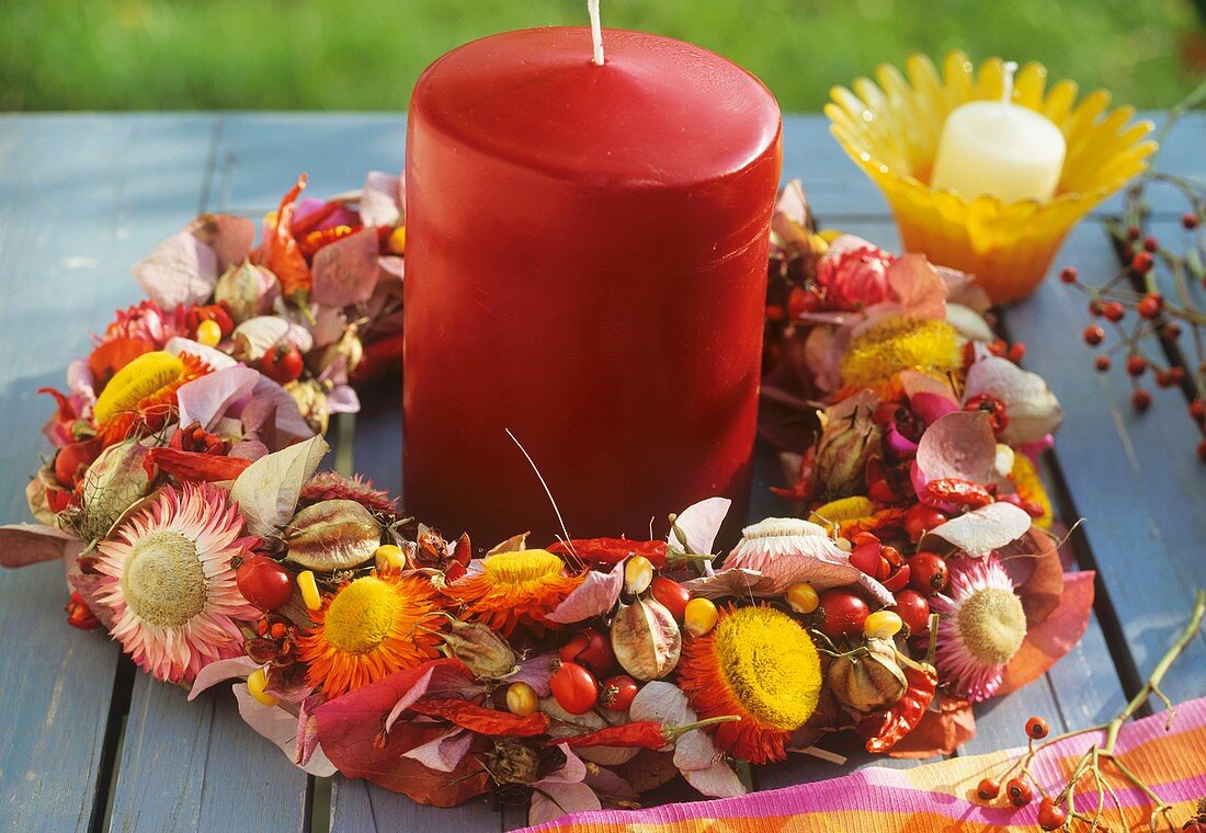 Autumnal wreath of dried flowers and rose hips