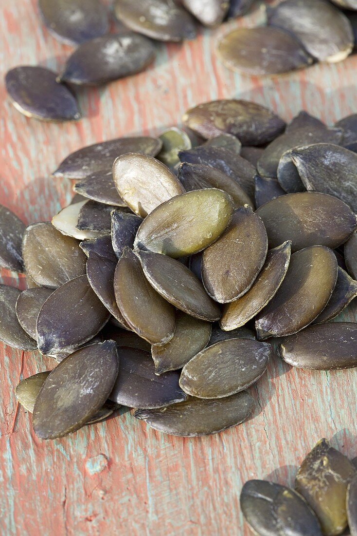 Pumpkin seeds on wooden table