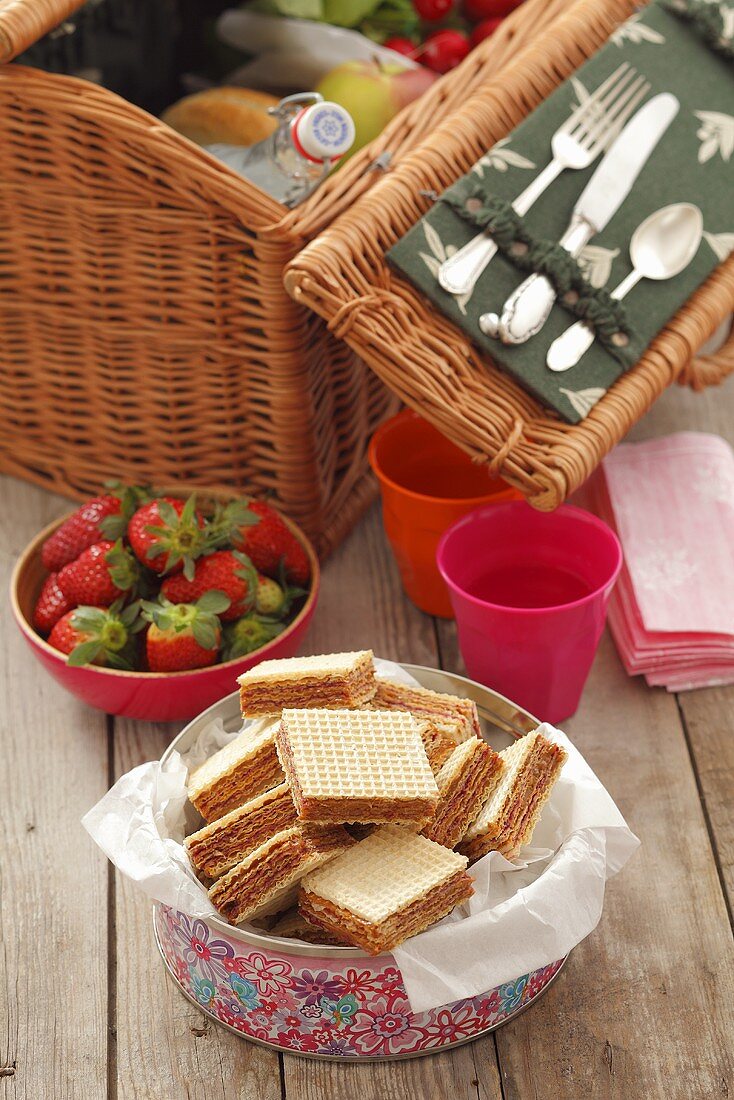 Wafer biscuits filled with jam and walnut cream for a picnic
