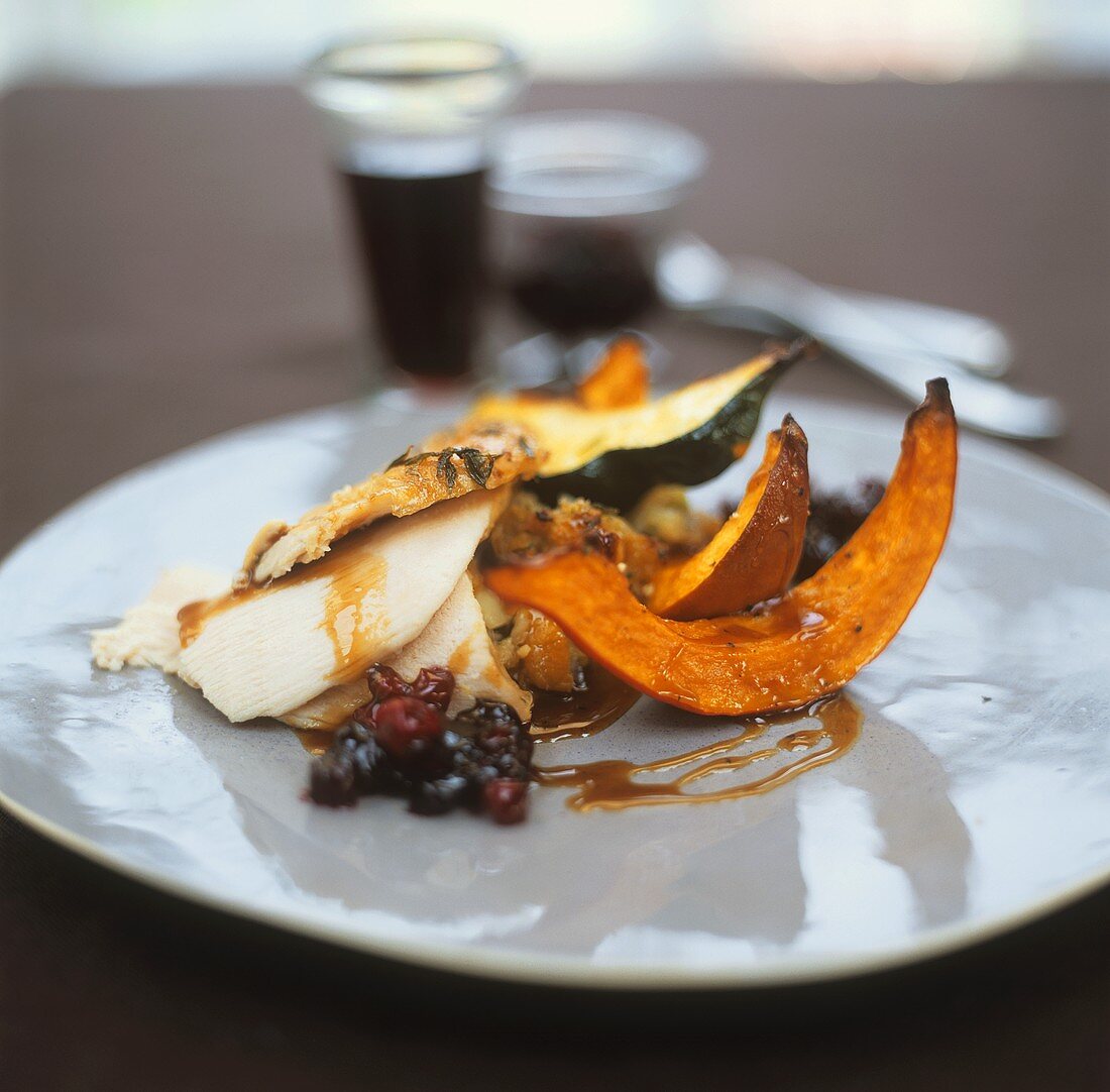 Turkey breast with baked pumpkin and berry sauce