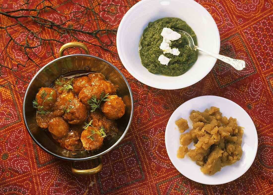 Sarson ka saag (Indian mustard greens) and meatballs