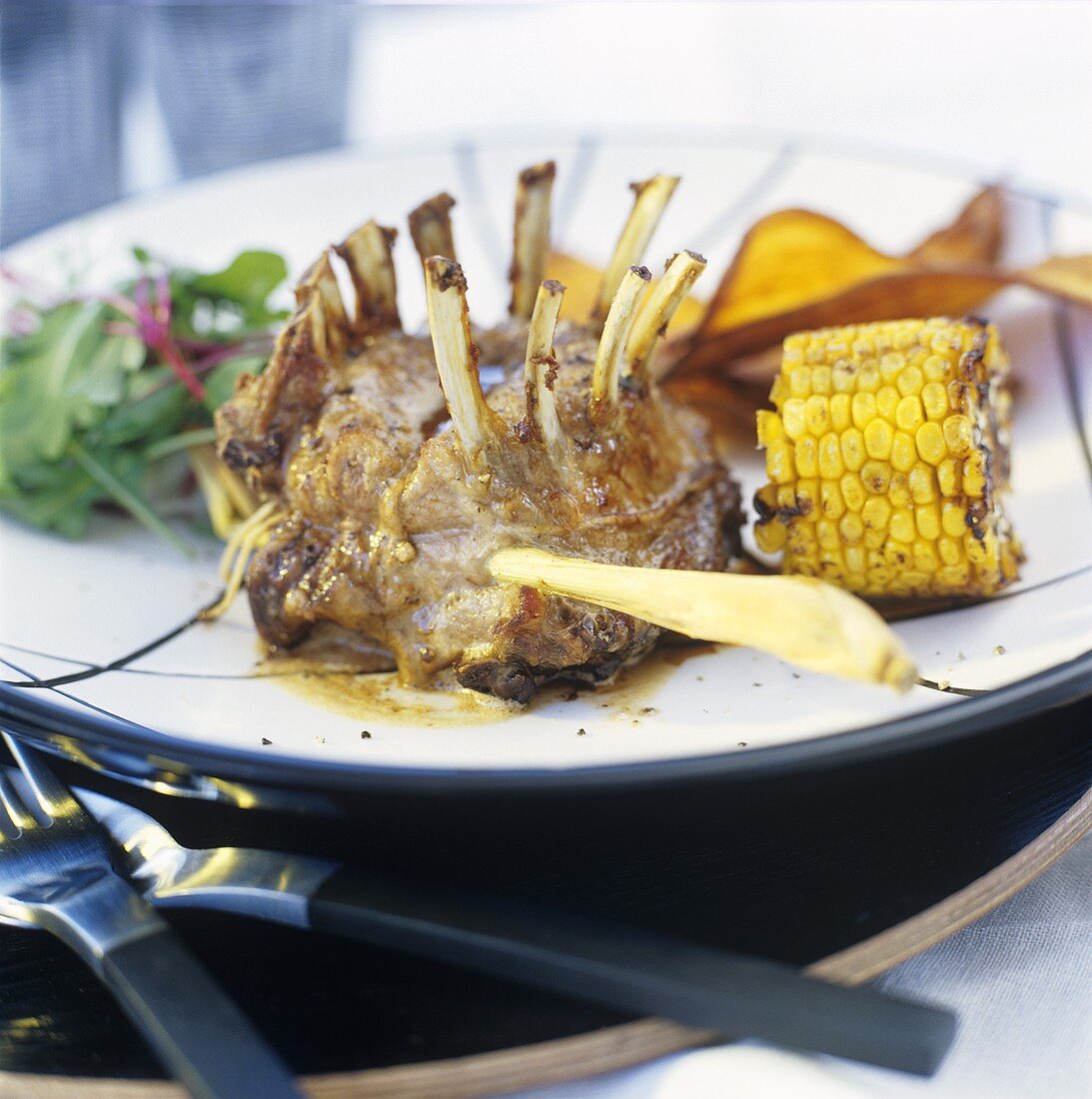 Wildschweinkoteletts mit Maiskolben und Süsskartoffeln