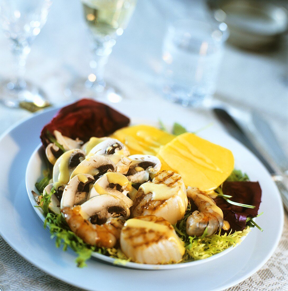 Grilled seafood with mushroom slices and mango
