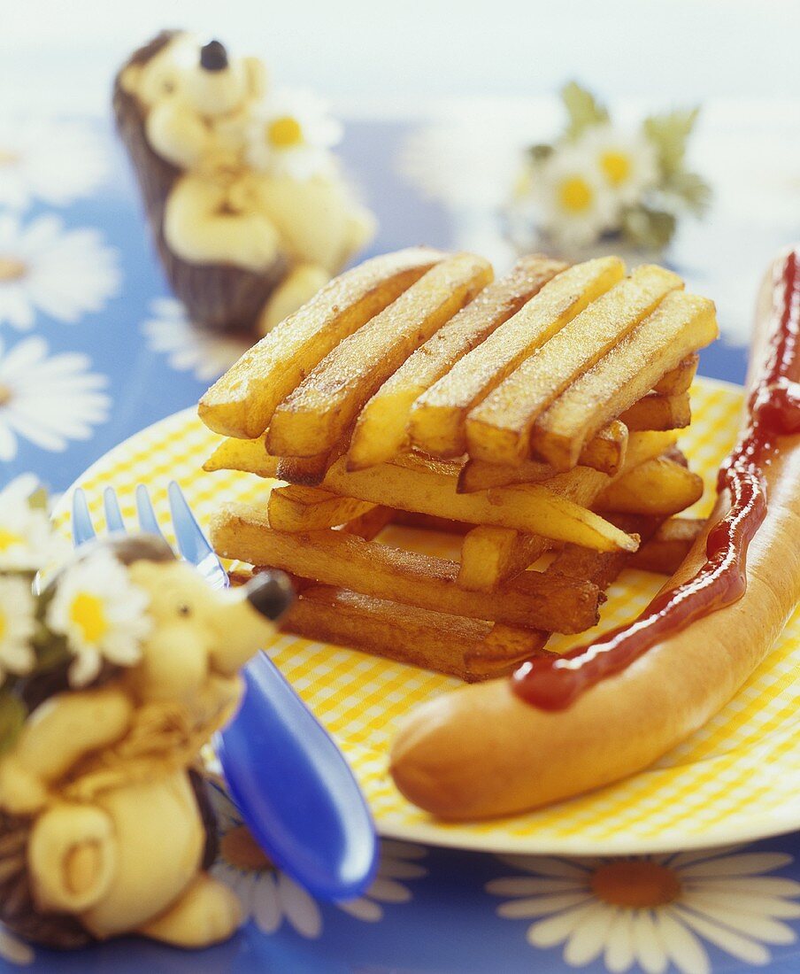 Chips and frankfurter with ketchup