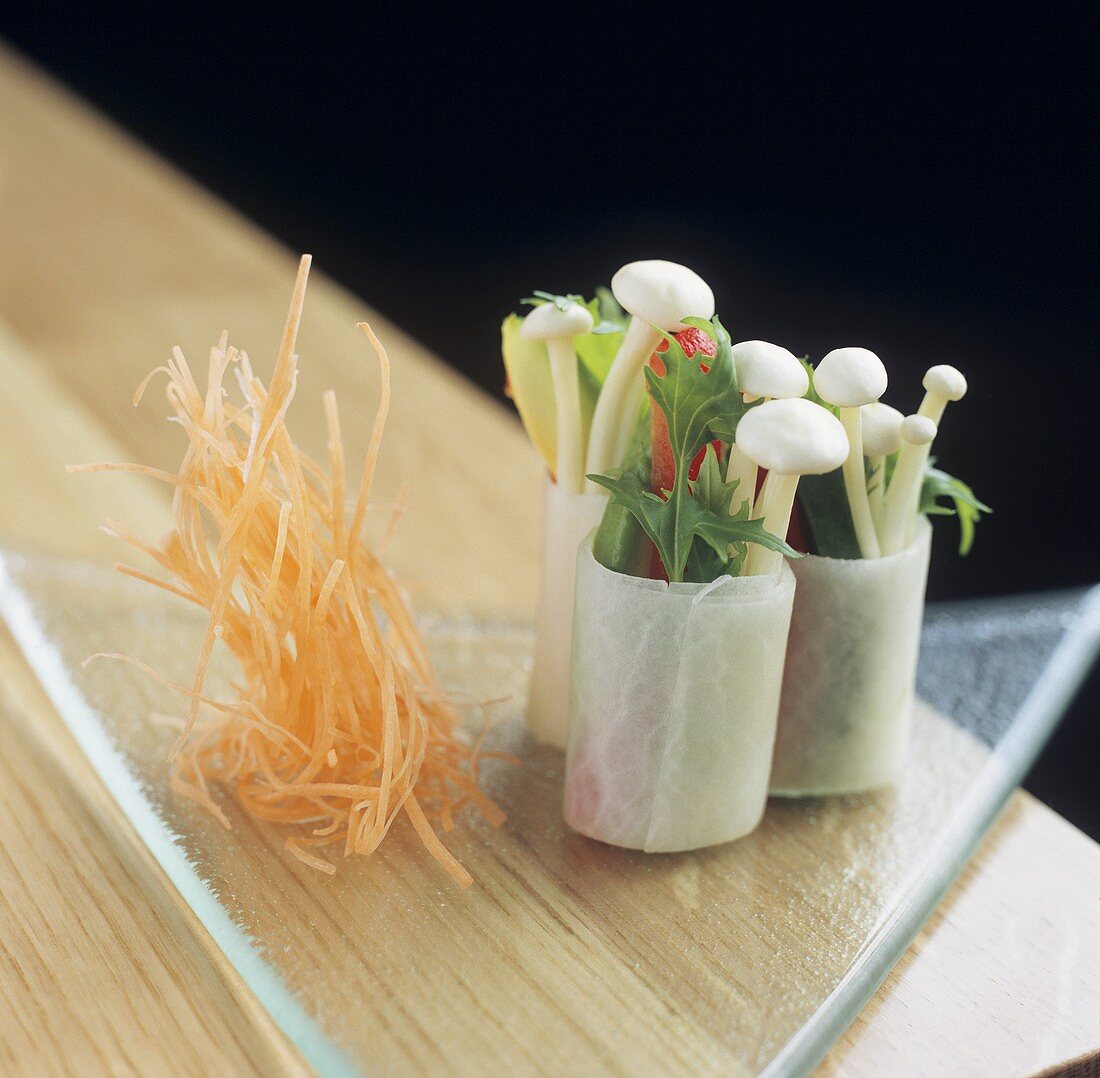 Rice paper rolls filled with vegetables and enokitake
