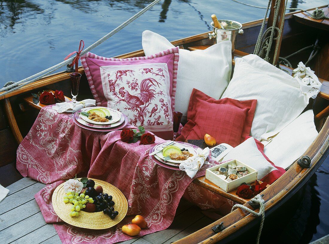 Romantic picnic for two on a boat
