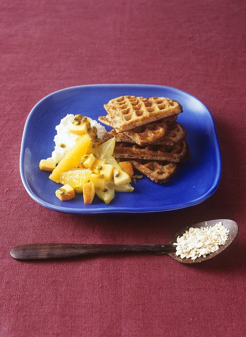 Oat and nut waffles with ricotta and fruit