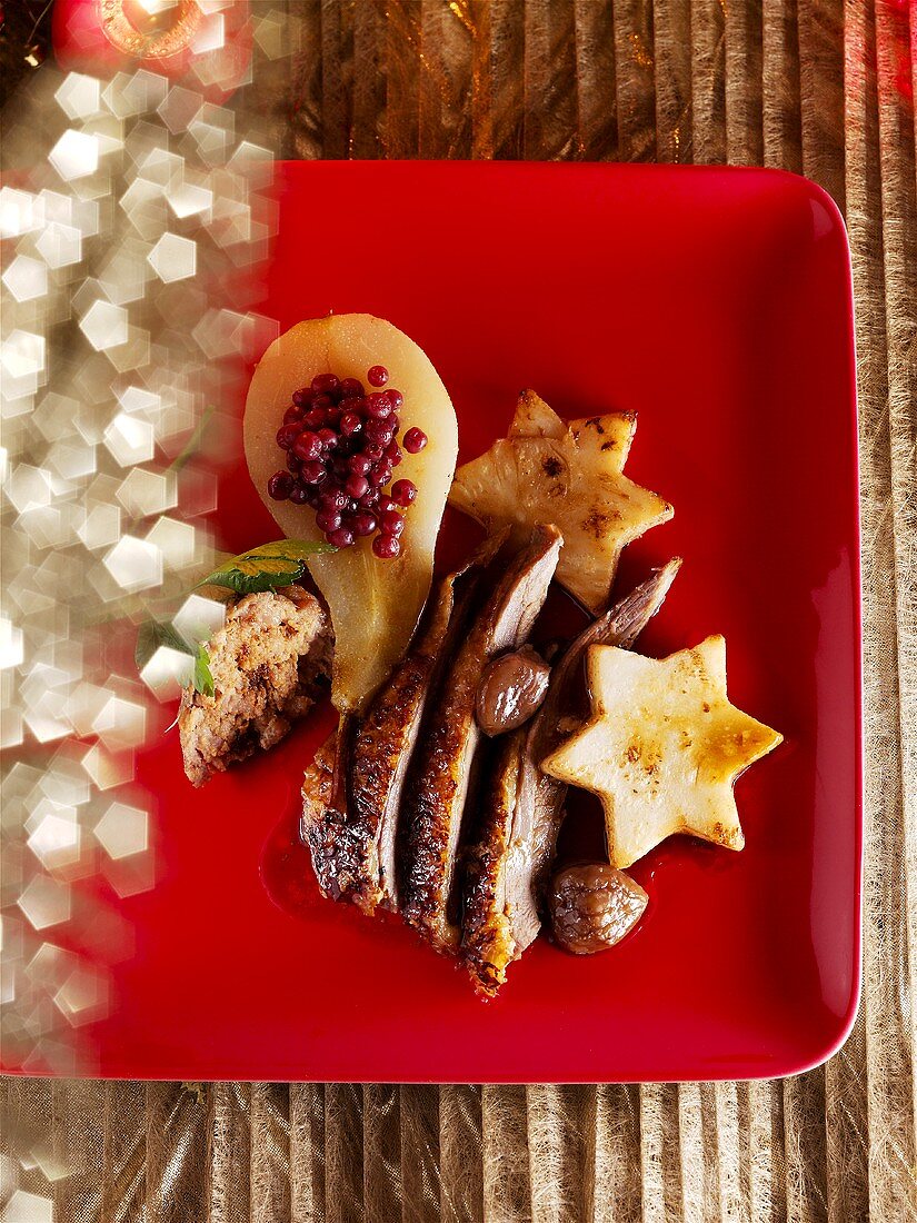 Roast goose with cranberry-stuffed pear