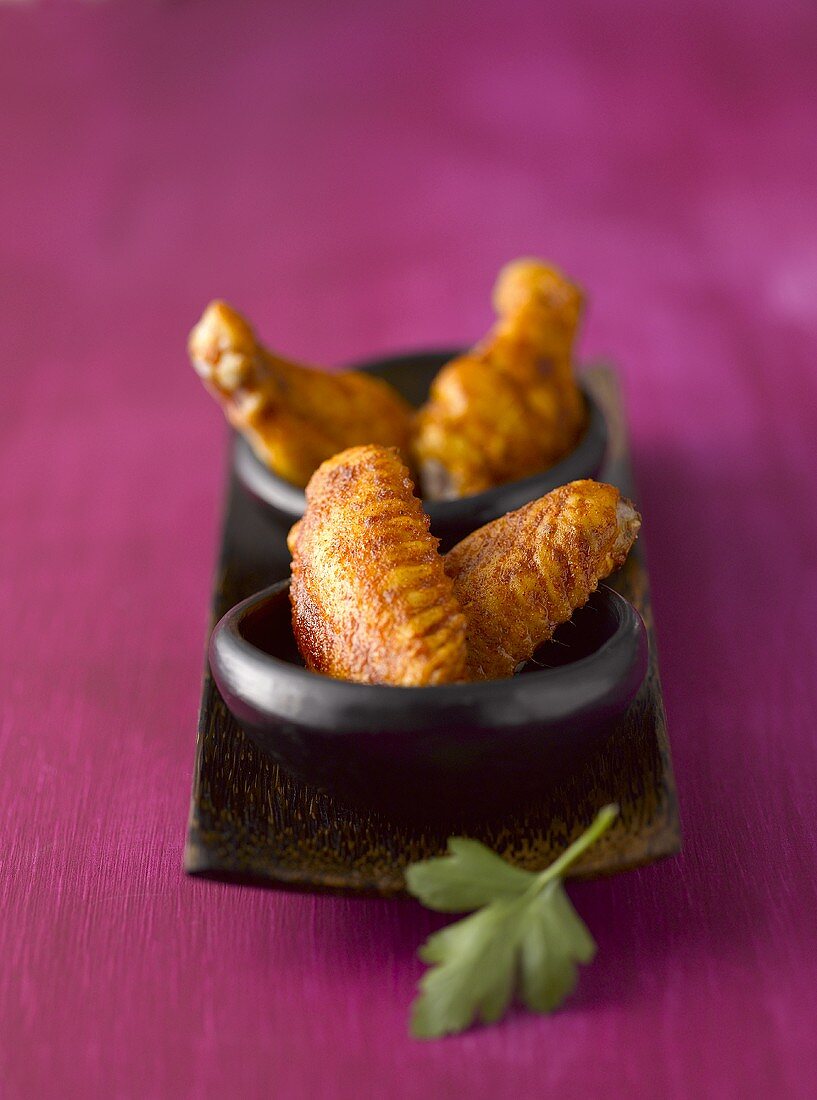 Chicken wings in Asian bowls