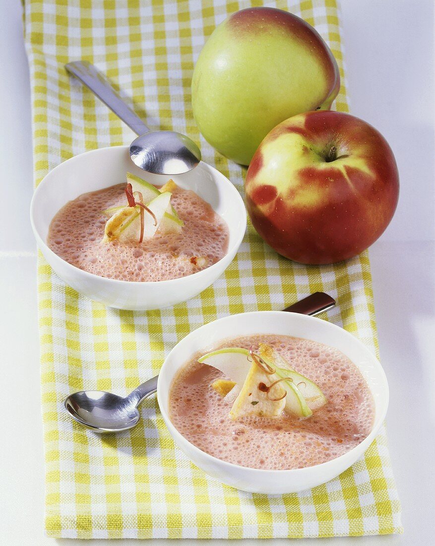 Red apple soup with strips of turkey