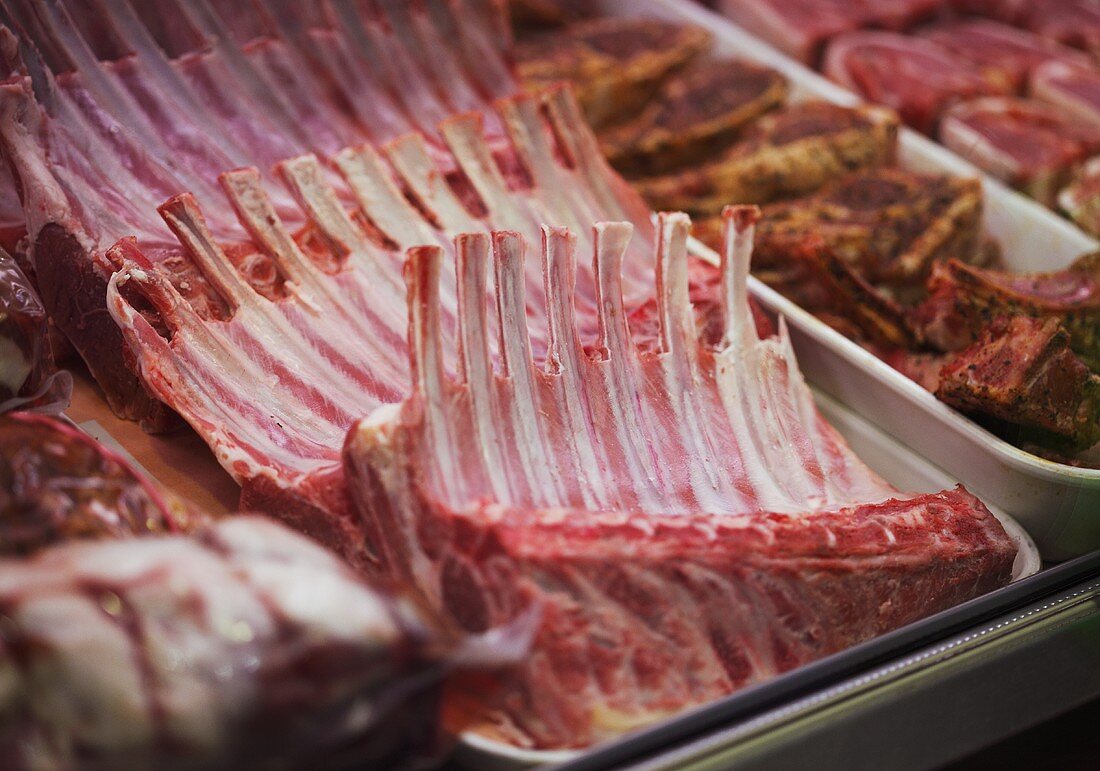 Racks of lamb on a meat counter