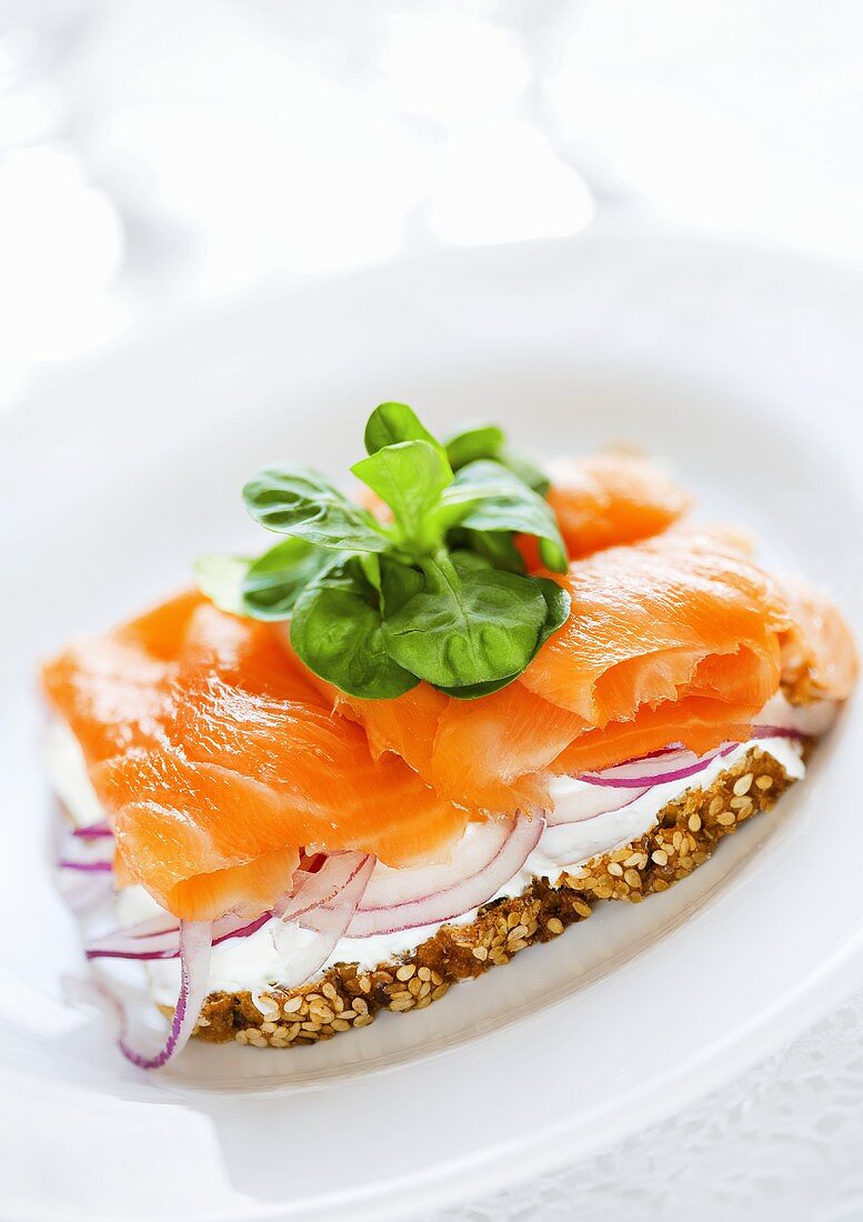 Cream cheese, smoked salmon and onion on wholemeal bread