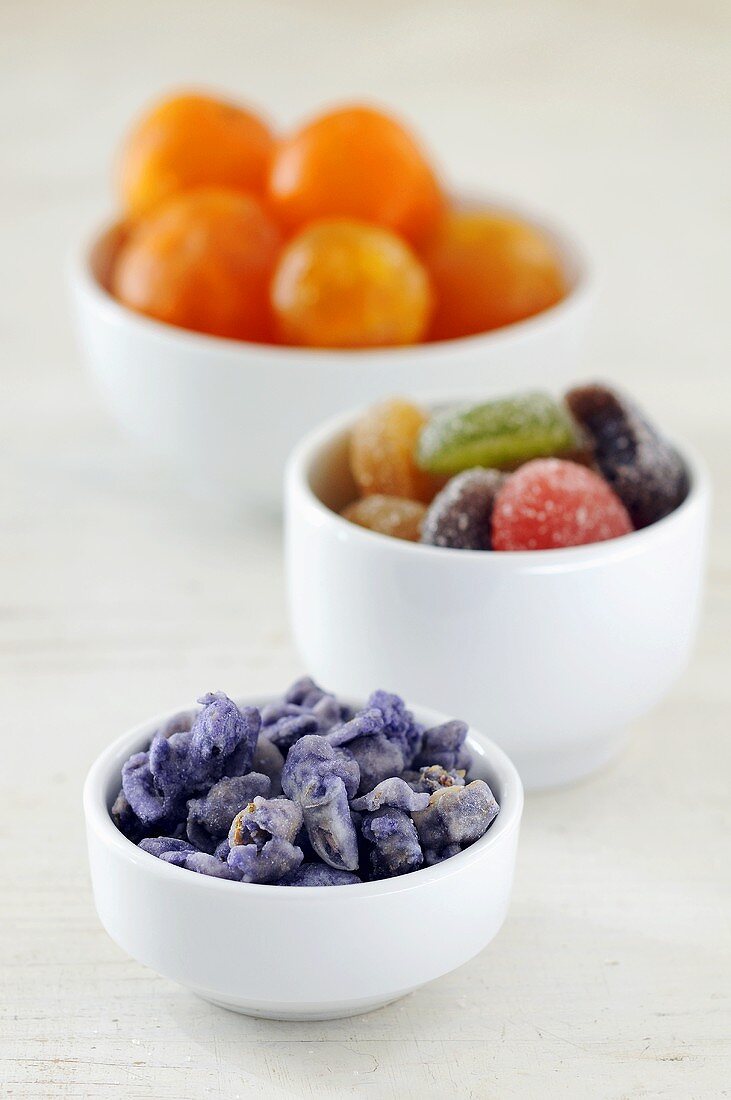 Candied fruit in three small bowls