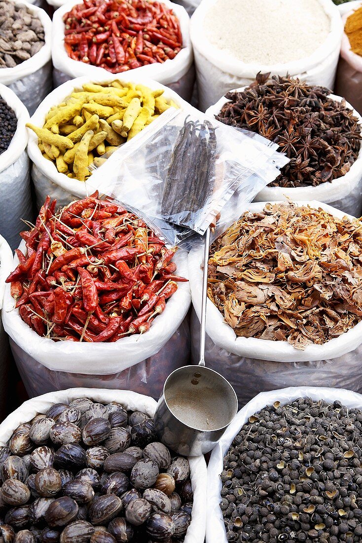 Various spices in sacks at a market
