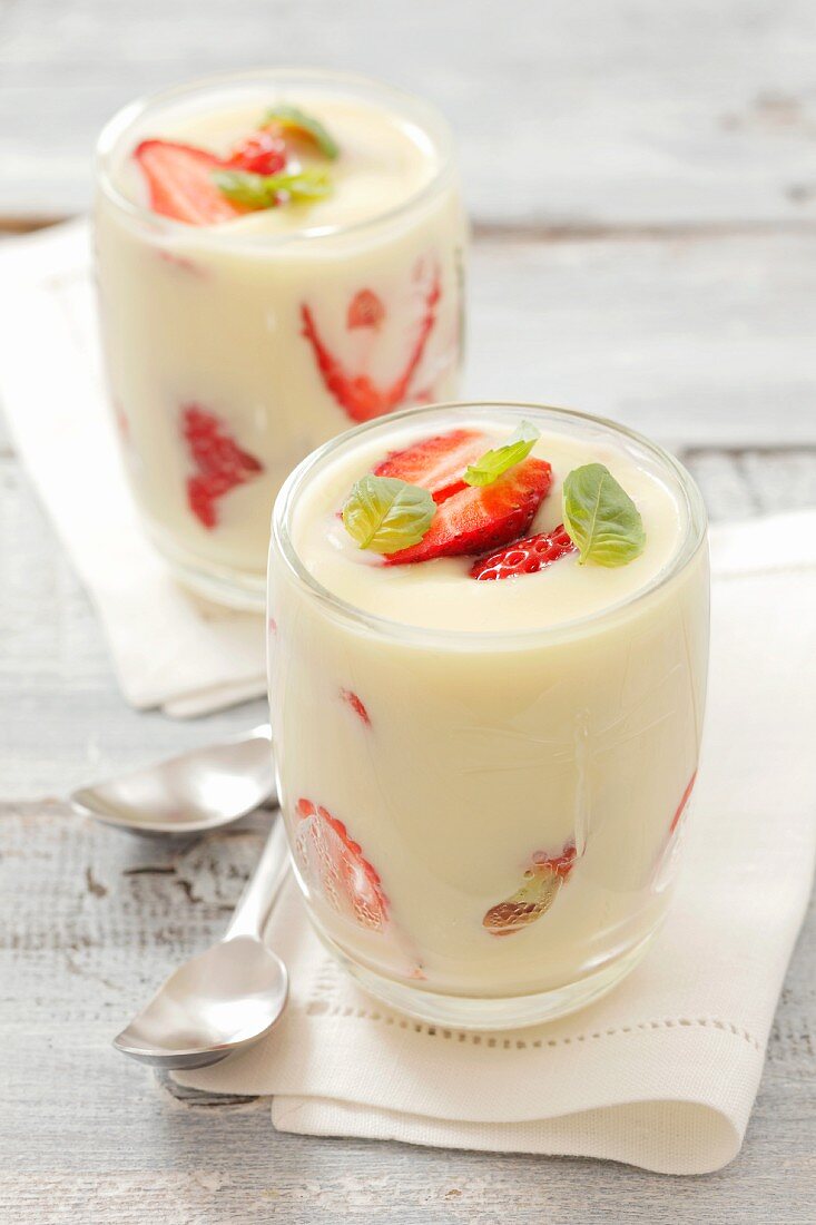 White chocolate mousse with strawberries and basil