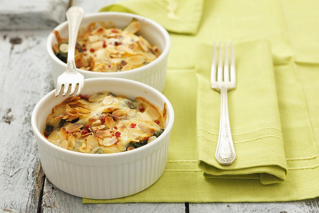 Spinach bake with cheese and flaked almonds