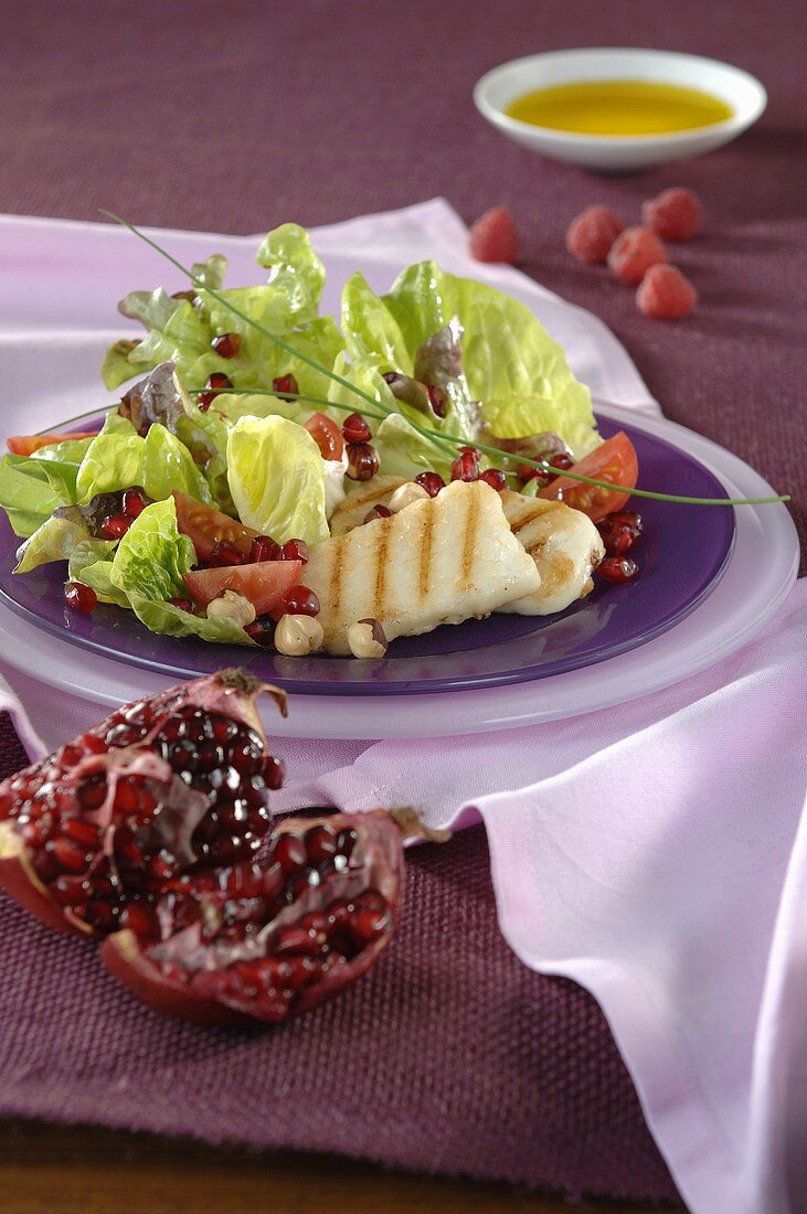 Lettuce with Halloumi cheese and pomegranate seeds