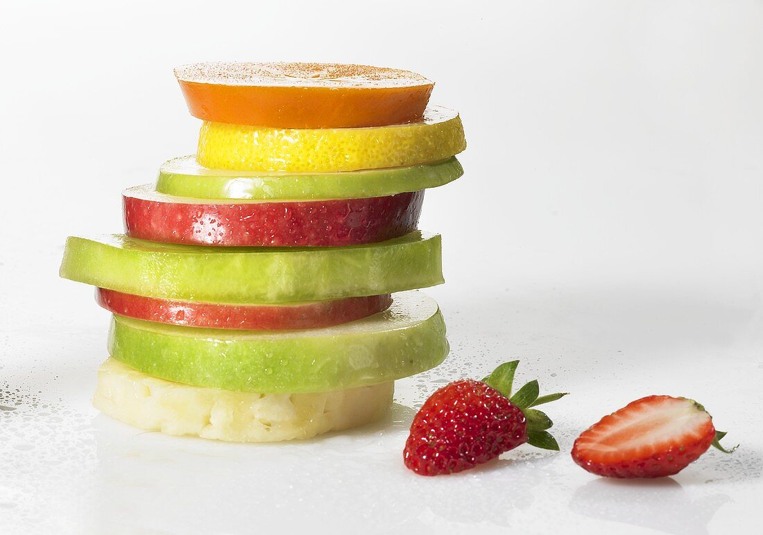 Slices of different fruit, stacked