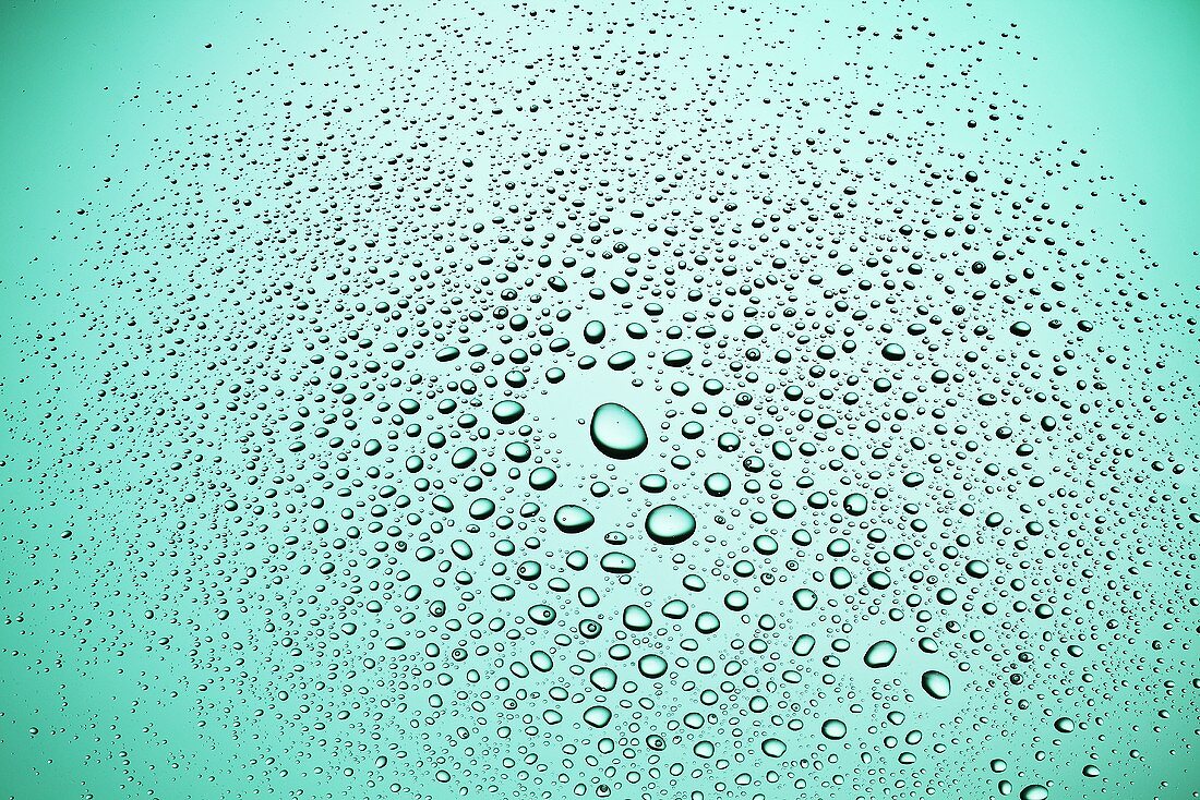 Drops of water on blue surface