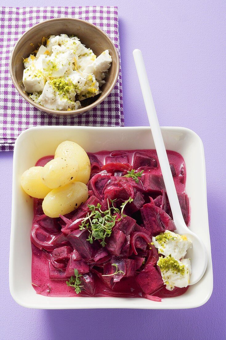 Beetroot with orange sauce, sheep's cheese and potatoes