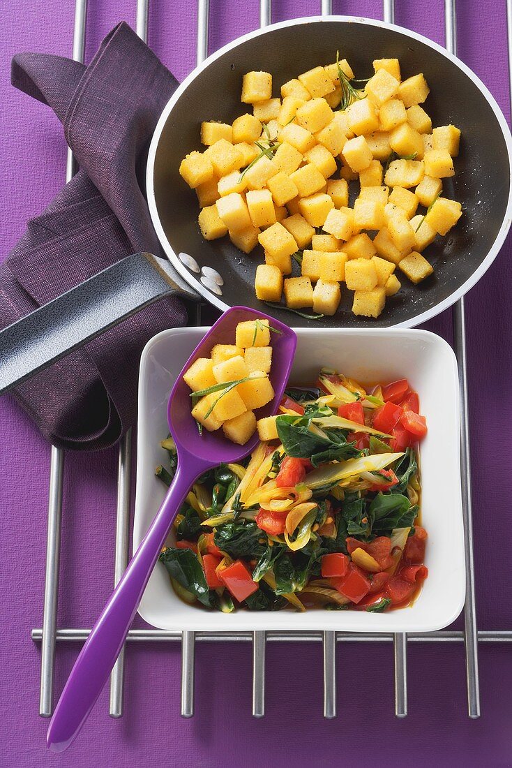 Cubes of polenta with chard