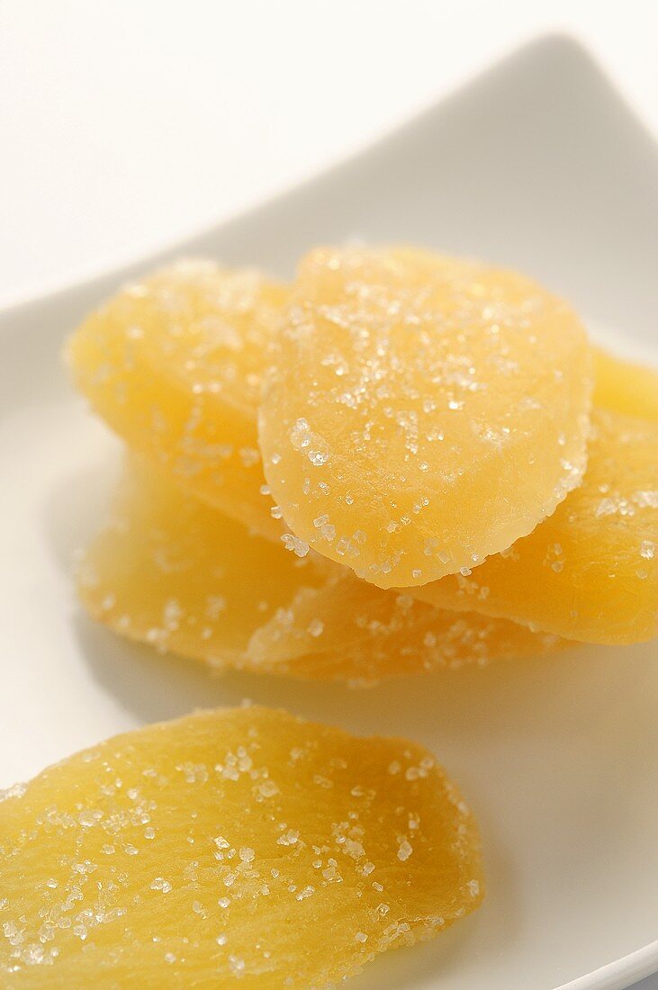 Pile of Candied Ginger on White Background