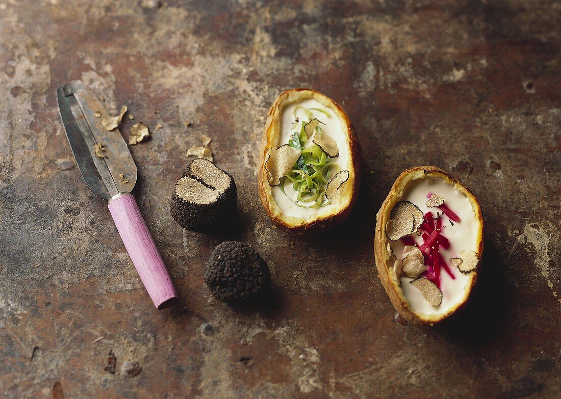 Baked potatoes with truffle cream, beetroot & leeks