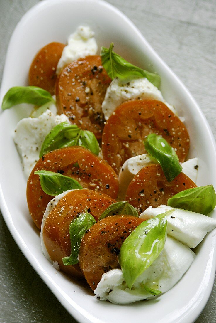 Tomatoes with mozzarella and basil